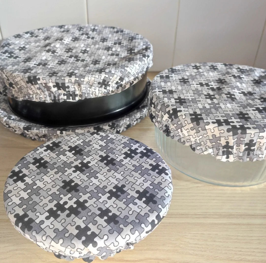 Charlottes alimentaires couvres plats noir motifs puzzle