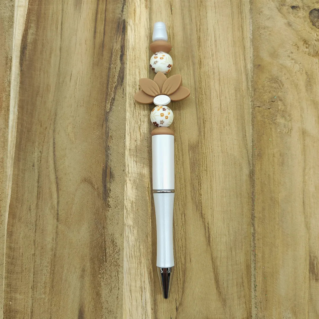 stylo blanc fleur de lotus marron