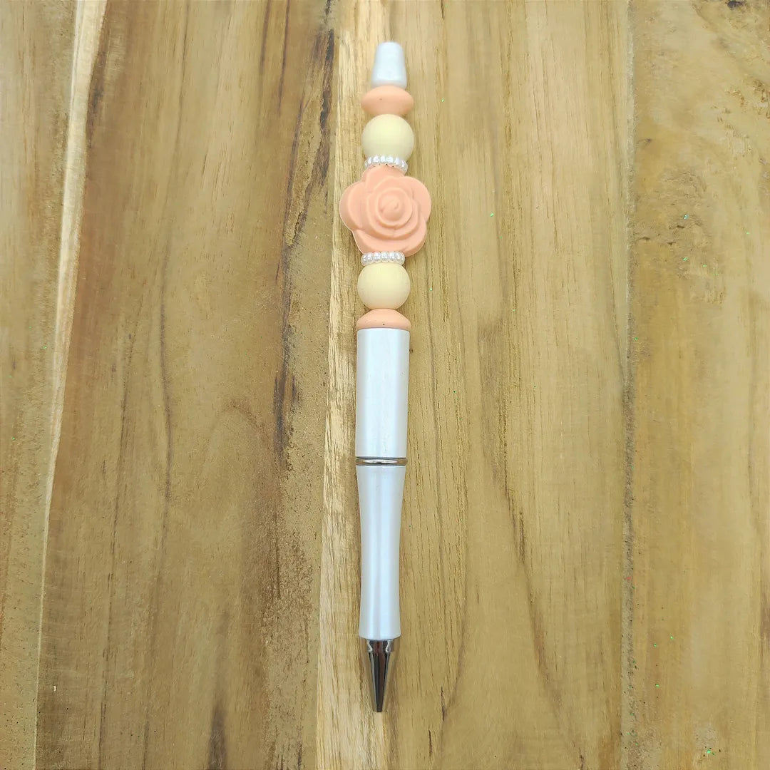stylo blanc rose