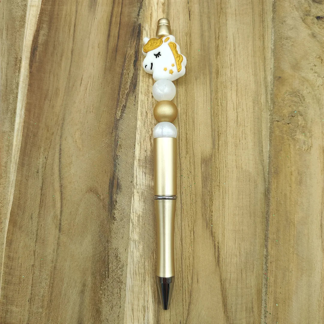 stylo doré licorne