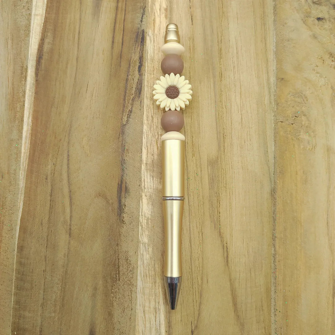 stylo doré marguerite