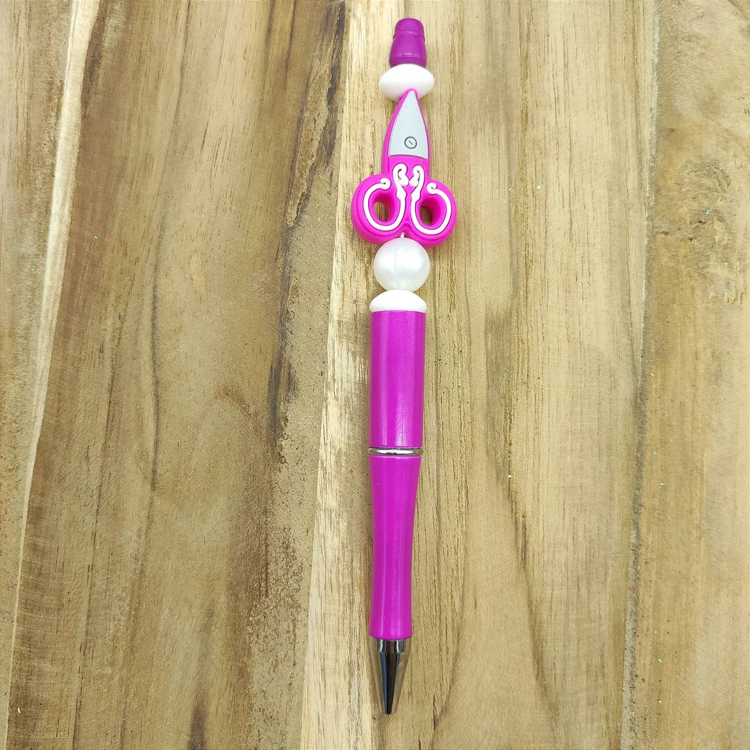 stylo rose ciseau